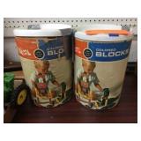 2 bins of Playskool colored blocks