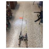2 fishing poles with reels