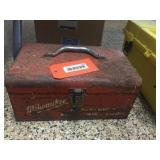 Metal box with assorted contents