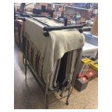 Roll away bed & clothes rack