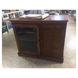 SWivel top TV stand w/glass front door