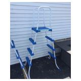 Double sided pool ladder