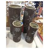 4 vases with snow flakes