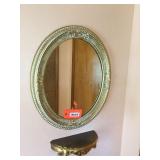 Oval framed mirror & shelf