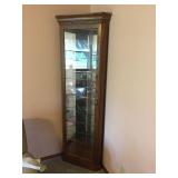 Lighted corner curio with glass shelves &