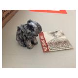 Miniature elephant carved of volcanic ash. 2"
