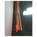 Yard sticks with advertising