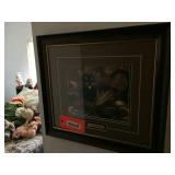 Assorted lamps in room & items on wall