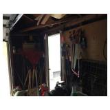 Tools on peg board & behind door