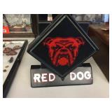 Red Dog sign. Power cord is cut off