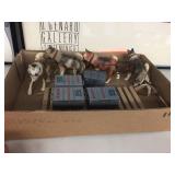 Plastic dog sled team