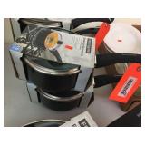 2 new Frigidaire saucepans