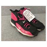 Pink football cleats w/signatures