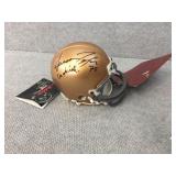 Mini Notre Dame helmet signed by Aaron Taylor &