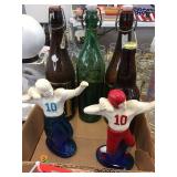 Glass beer bottles, football cologne bottles