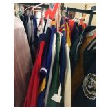 Assorted sports teams clothing in assorted sizes