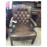 Open arm executive chair (2 tears in cushion)