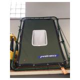 Primed ball back stop