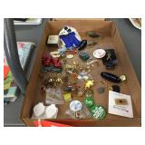 Assorted pins, keychains & assorted
