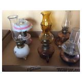 Miniature oil lamps. 8" tall
