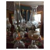 2 oil lamps with chimneys. 16" & 18" tall