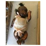 Doll. 9" tall