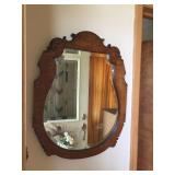 Oak framed beveled mirror. 21"x27"