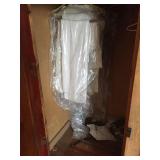 Contents of closet. Table cloths & linens