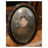 Oval framed decorator picture. 22"x17"