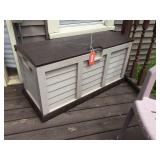 Deck box with assorted contents. 45"x19"x23"