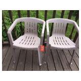 2 plastic outdoor chairs