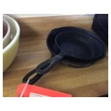 2 cast iron skillets