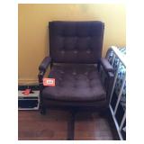 Upholstered desk chair on wheels