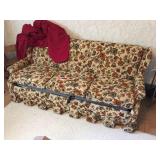 3 cushion sleeper sofa. Located upstairs. Curved