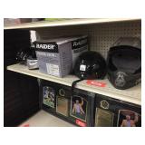 Assorted sized helmets on shelf
