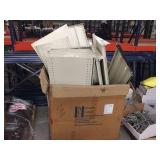 Pallet of metal shelves