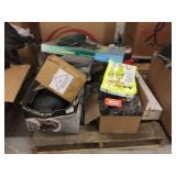 Pallet of helmets, ATV tire changers,store returns