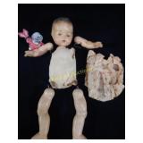 Antique doll as found