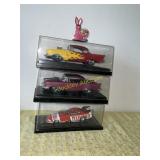 3 Cars And Display Cases