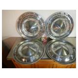 4 vintage Chevy Hub Caps