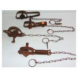 4 ANTIQUE STEEL ANIMAL TRAPS