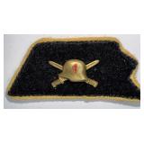 WWII GERMAN INSIGNIA BRASS HELMET CROSSED BAYONETS