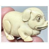 SIGNED CARVED IVORY PIG NETSUKE