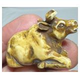 SIGNED CARVED NETSUKE - RECUMBENT COW - IVORY ???