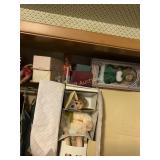 Dolls on top shelf