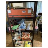 Shelf and contents including old magazines