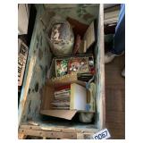 Wooden crate on wheels and contents