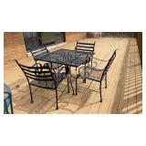 Patio table, 4 chairs with cushions/umbrella
