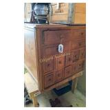 14 drawer wood cabinet with contents