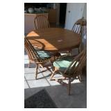 Wooden table, chairs and additional leaves